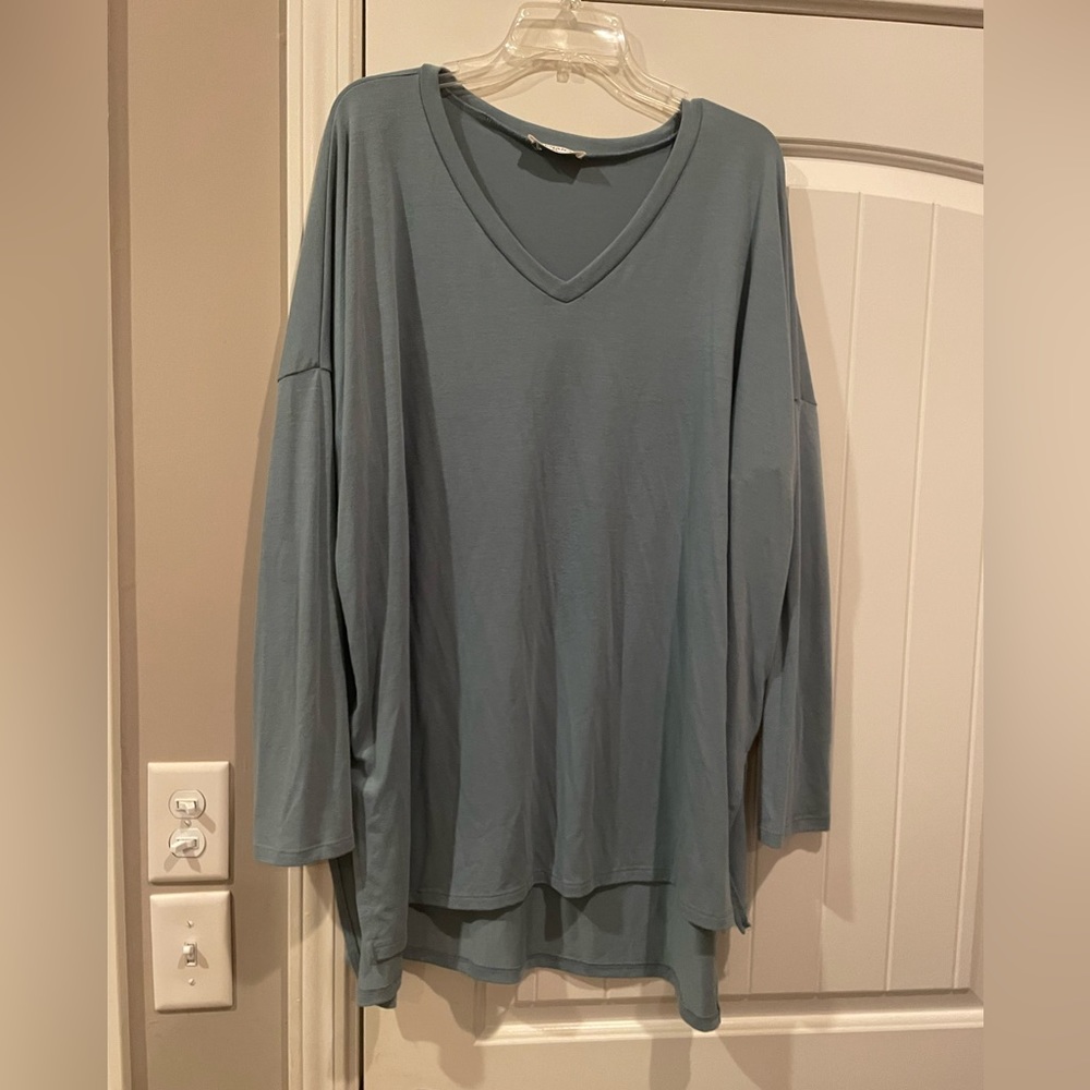 Zenana long sleeve top with side slits.
